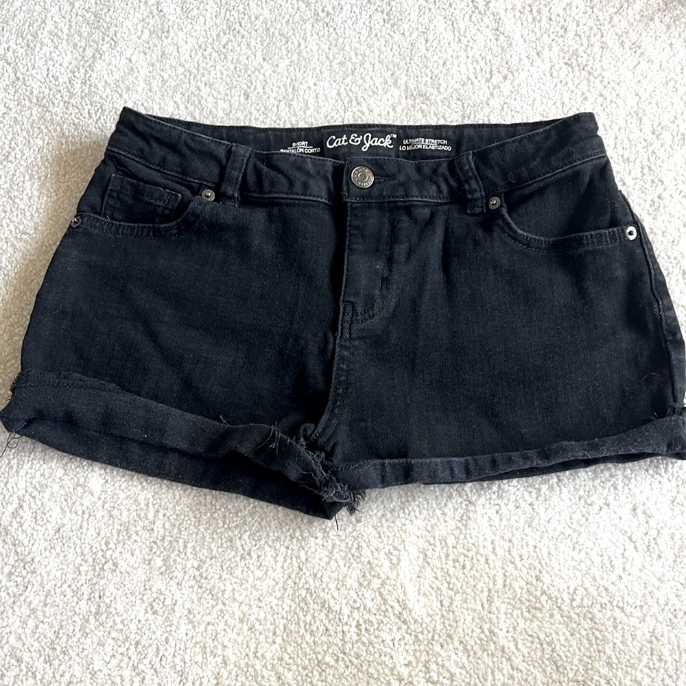 Black distressed jean shorts